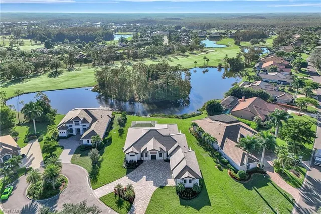 an aerial view of a house with a garden