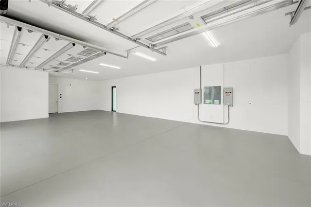a view of an outdoor sitting area with furniture and garden view