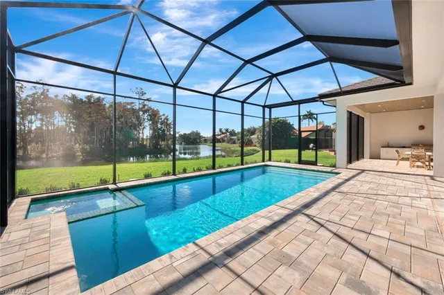 a view of a swimming pool with a porch