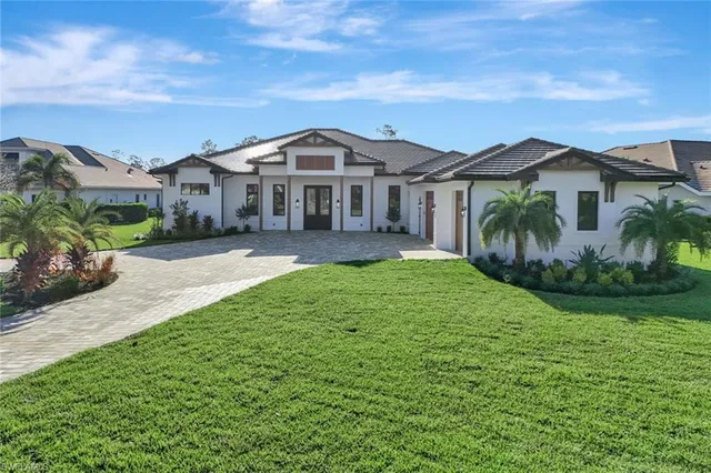 an aerial view of a house with a garden