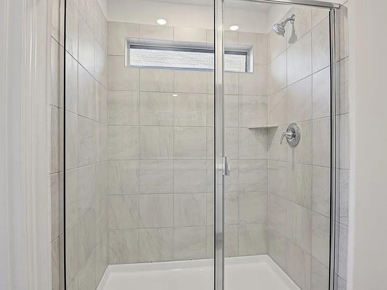 2203 Rannoch Street Sherman, TX 75092 - Photo 8 of 13 a bathroom with a shower