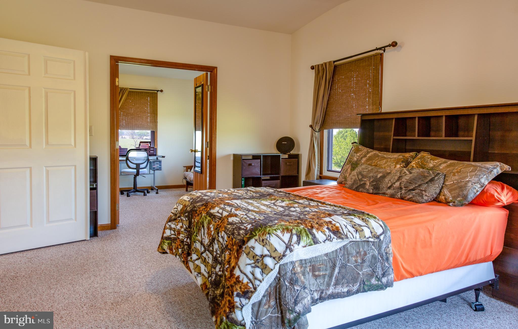 11428 Hill Road Keymar, MD 21757 - Photo 13 of 30 a bedroom with a large bed and a dresser