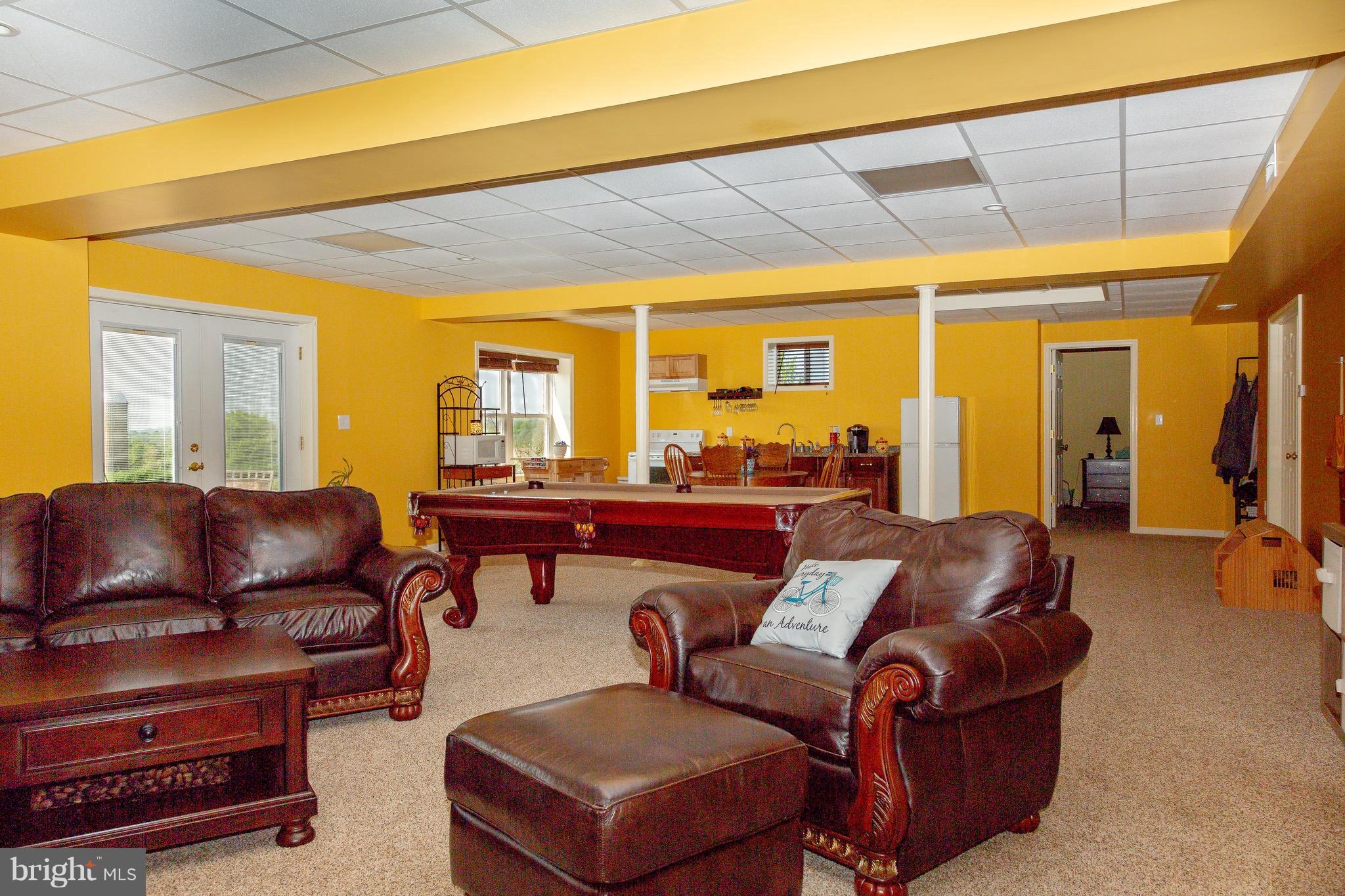 11428 Hill Road Keymar, MD 21757 - Photo 19 of 30 a living room with furniture and a large window