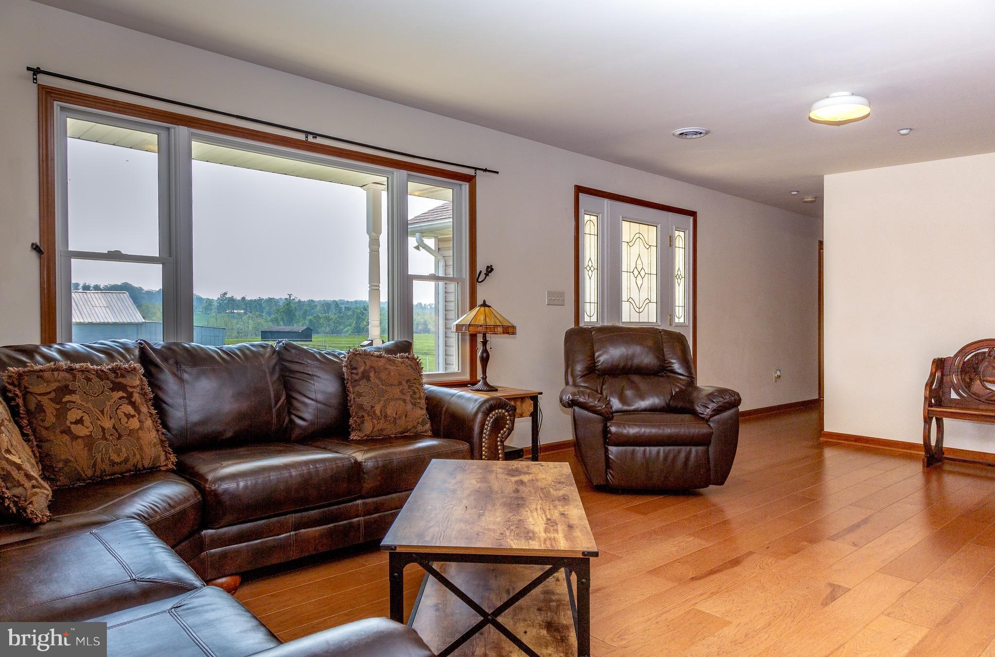 11428 Hill Road Keymar, MD 21757 - Photo 3 of 30 a living room with furniture and a large window