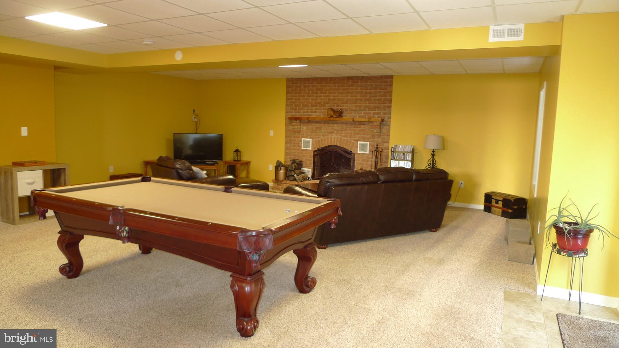 11428 Hill Road Keymar, MD 21757 - Photo 20 of 30 a living room with furniture pool and a table