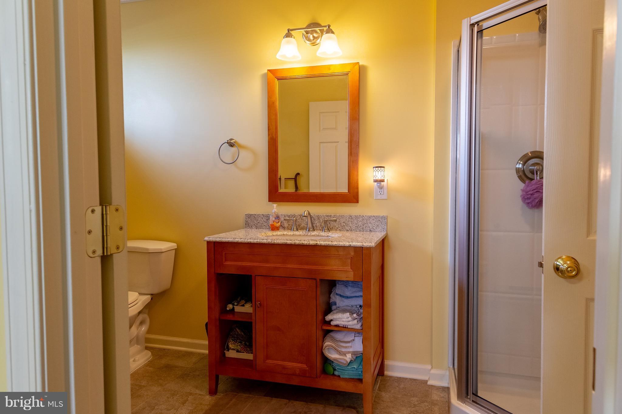 11428 Hill Road Keymar, MD 21757 - Photo 25 of 30 a bathroom with a sink and a mirror