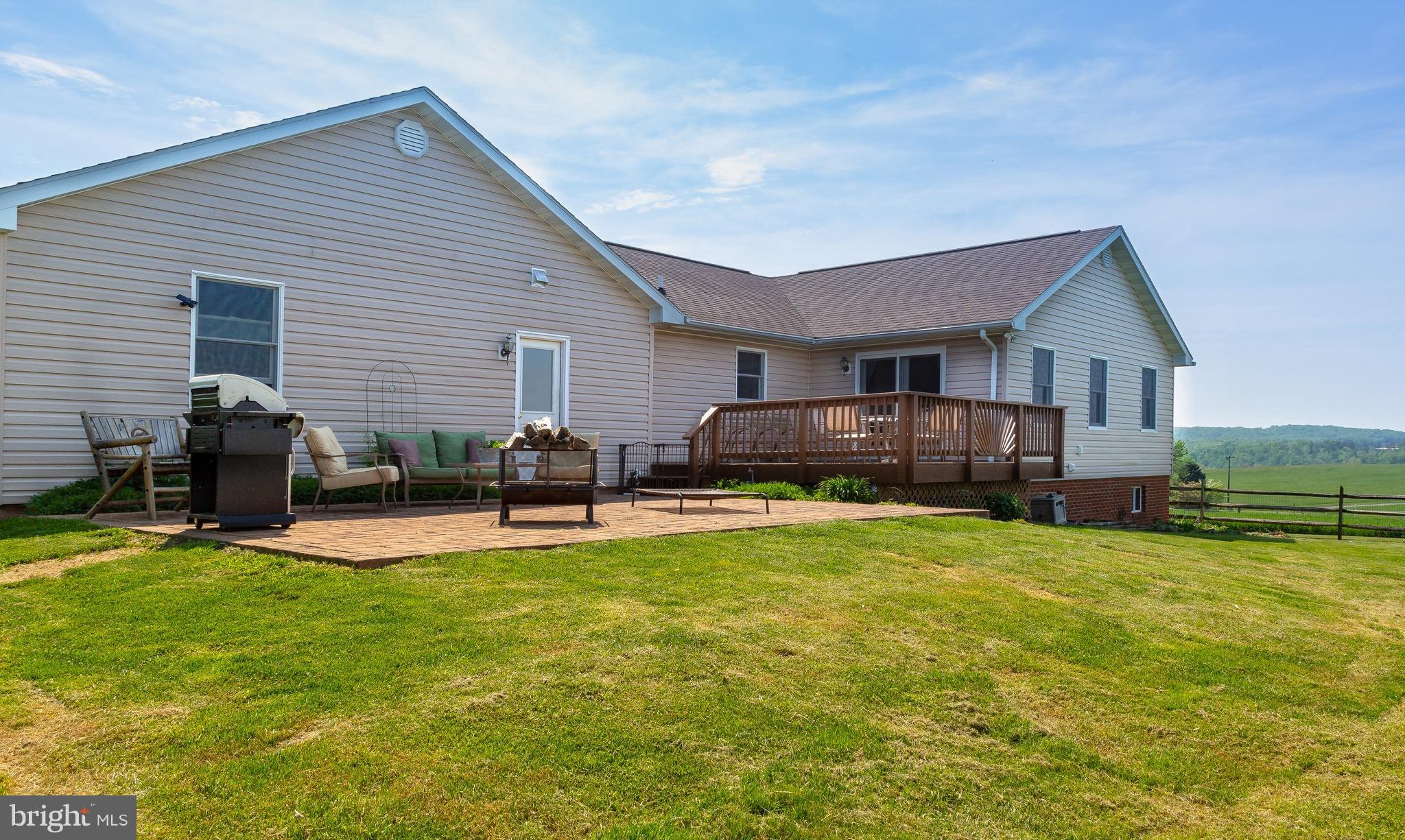11428 Hill Road Keymar, MD 21757 - Photo 29 of 30 a view of a house with backyard porch and sitting area