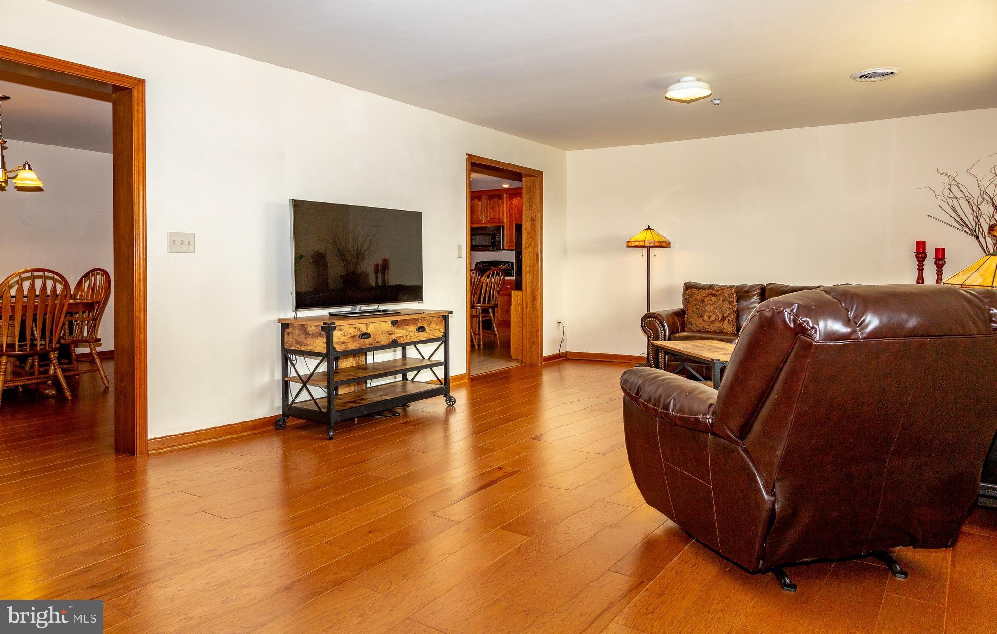 11428 Hill Road Keymar, MD 21757 - Photo 4 of 30 a living room with furniture and a flat screen tv