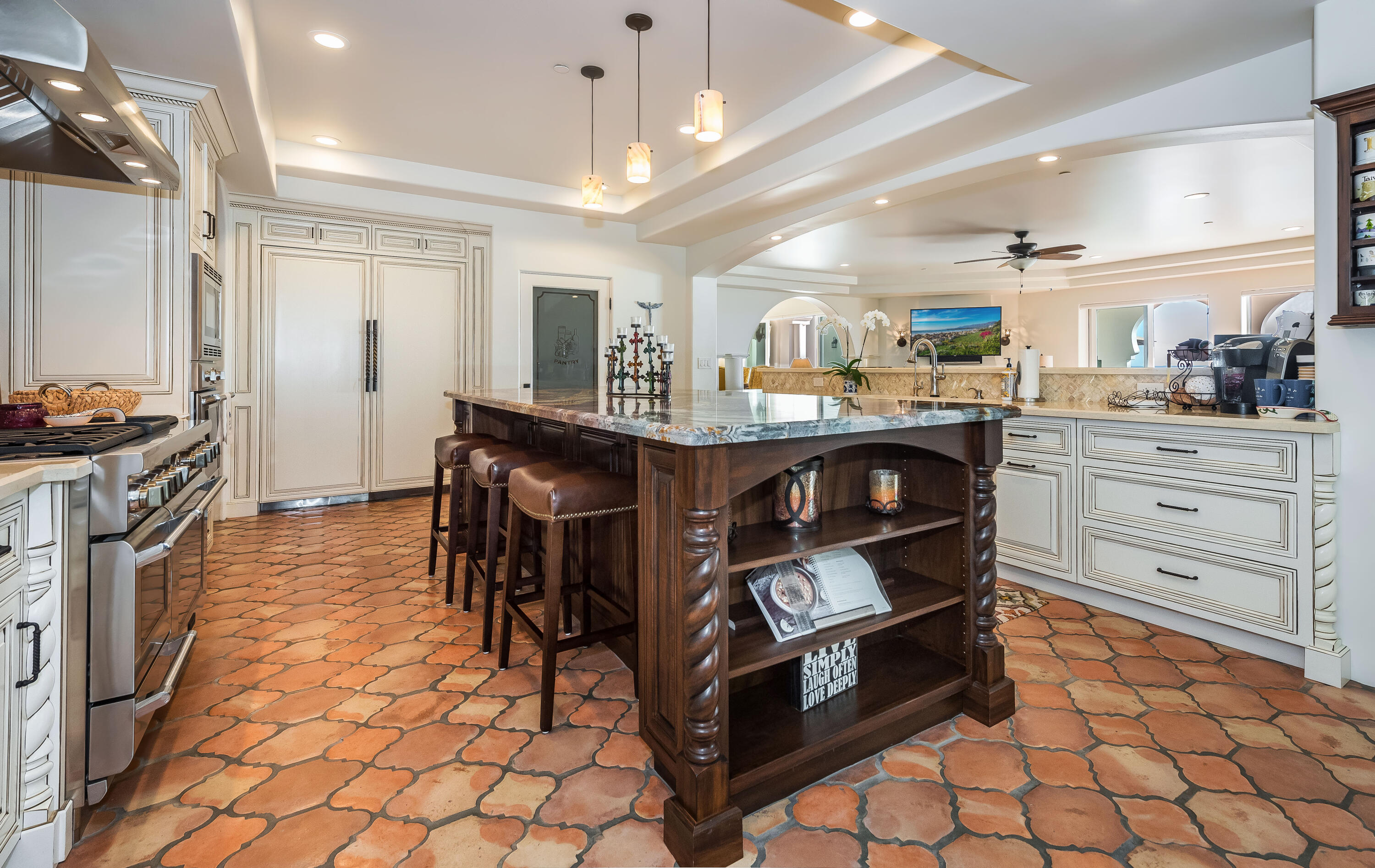 875 Sand Point Road Carpinteria, CA 93013 - Photo 7 of 25 a kitchen with stainless steel appliances granite countertop a stove a sink and a refrigerator