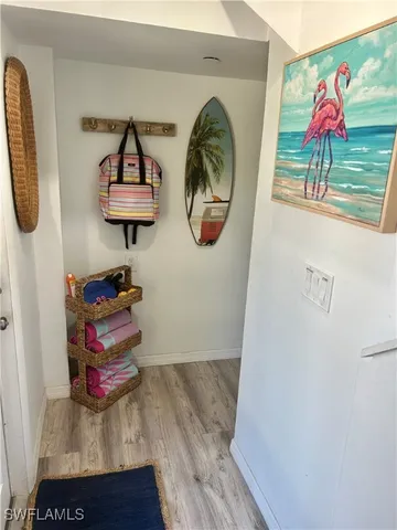 a kitchen with a refrigerator and countertop