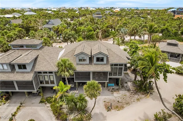 a view of a balcony with plants