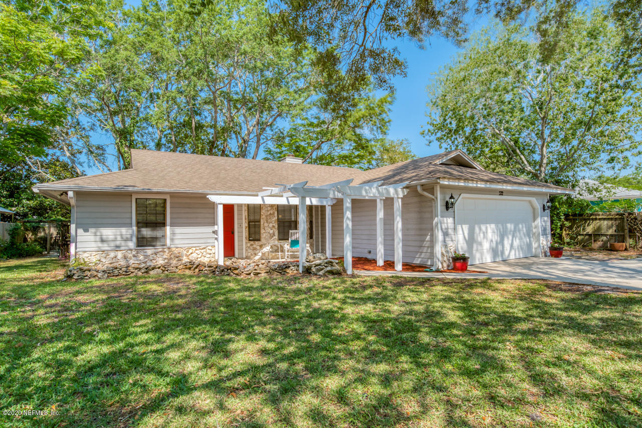 332 Shamrock Road St. Augustine, FL 32086 - Photo 1 of 26 front view of a house with a yard