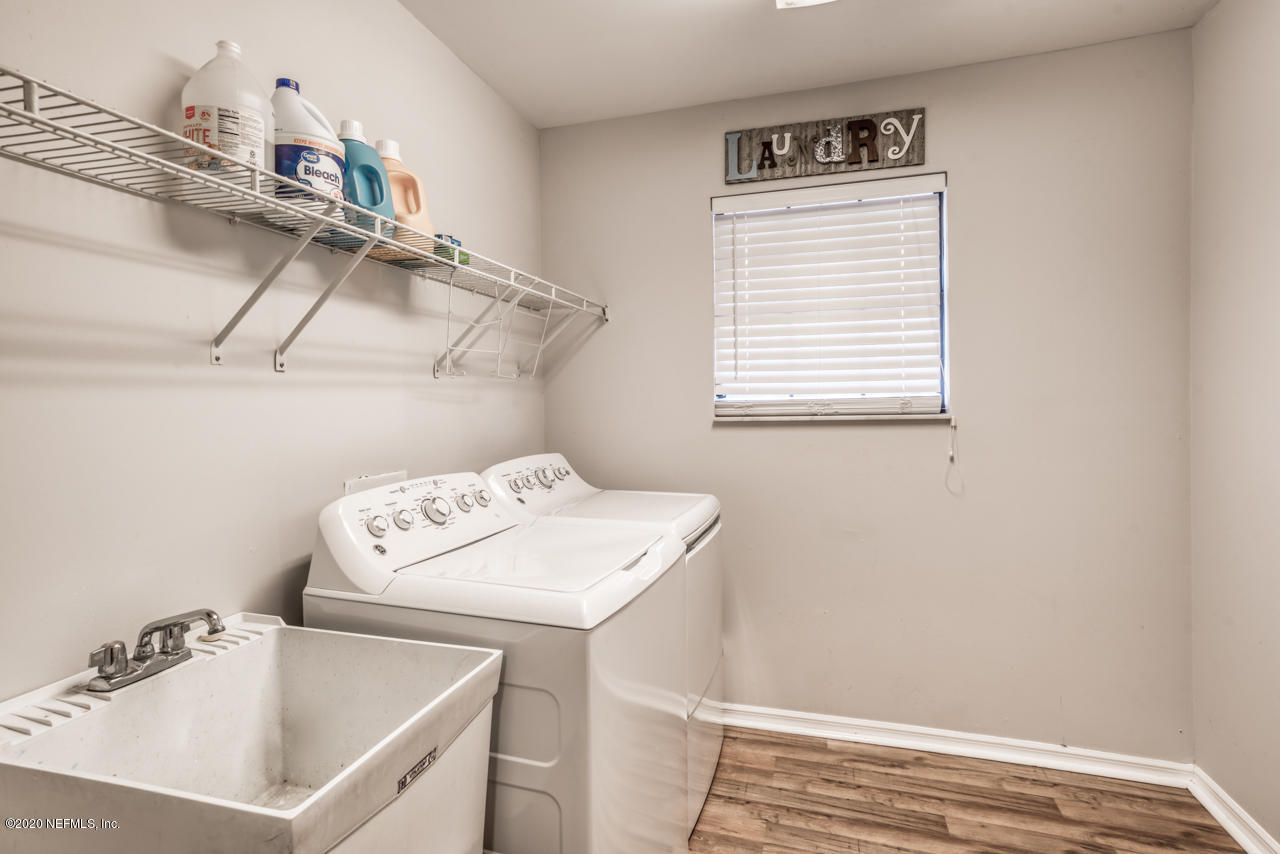 332 Shamrock Road St. Augustine, FL 32086 - Photo 21 of 26 a utility room with dryer and washer