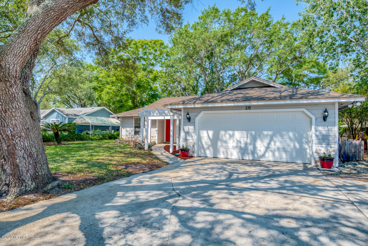 332 Shamrock Road St. Augustine, FL 32086 - Photo 26 of 26 a front view of a house with a yard
