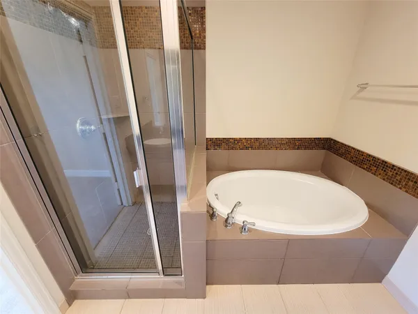 a view of a bathtub in a bathroom