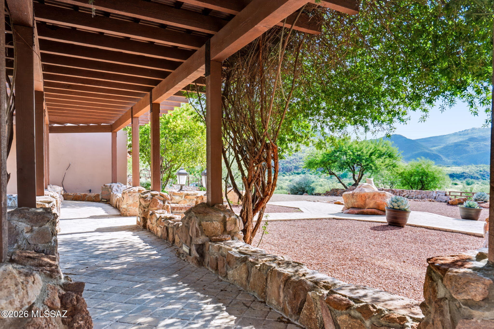 1052 Morning Star Drive Rio Rico, AZ 85648 - Photo 12 of 50 Covered breezeway to garage