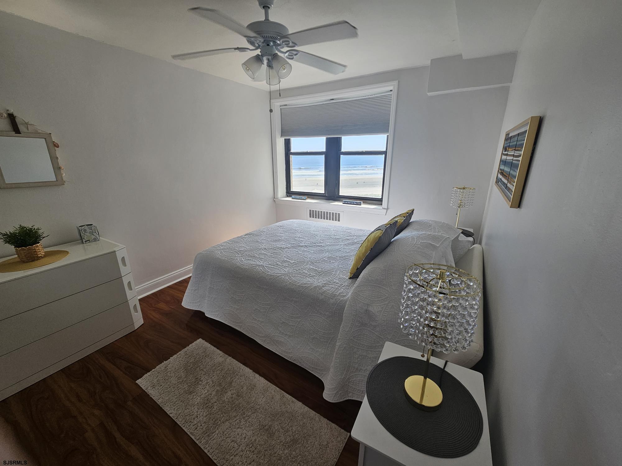 101 South Raleigh Avenue, Unit 734 Atlantic City, NJ 08401 - Photo 13 of 32 a bed room with a bed and a window