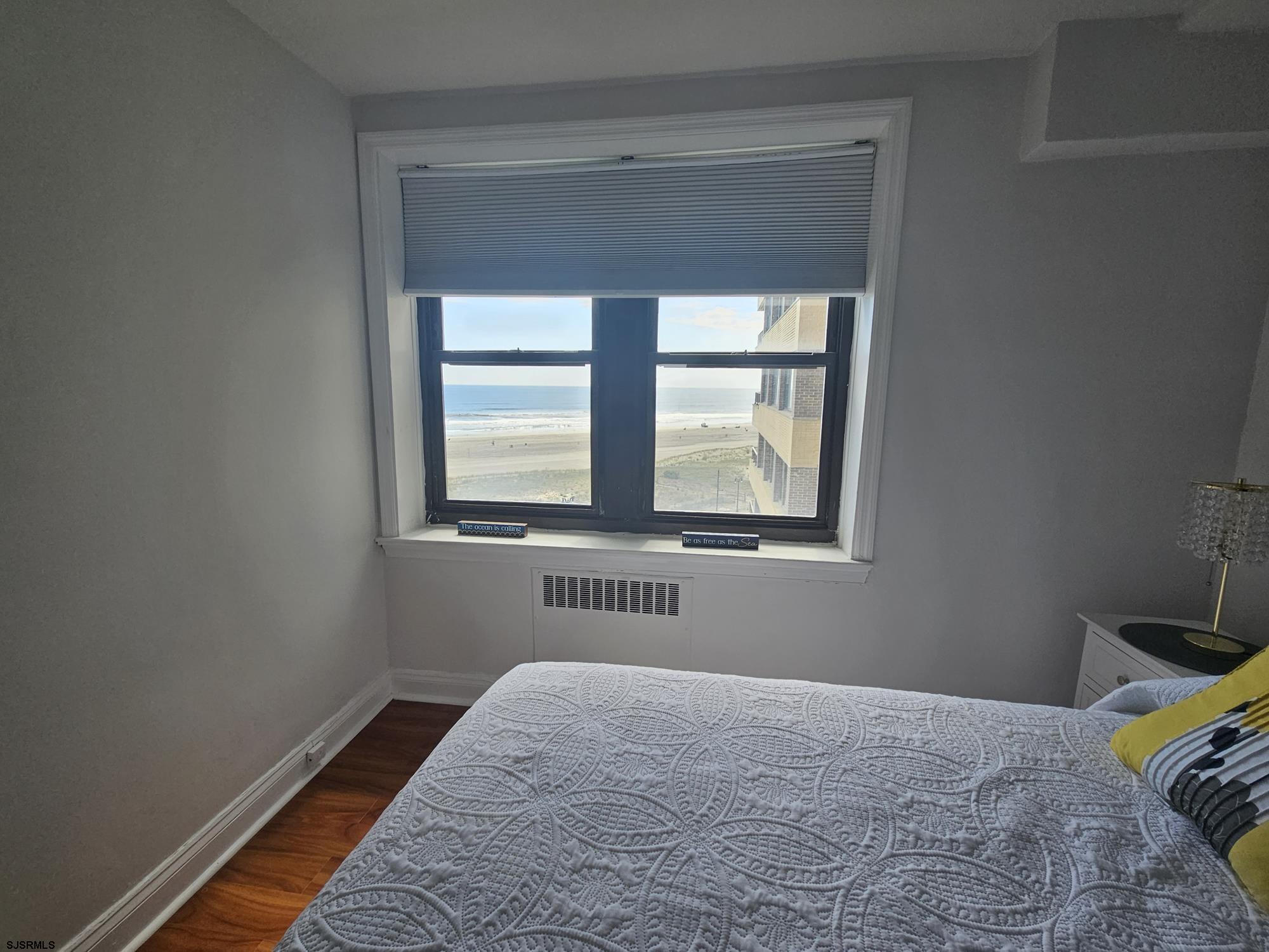 101 South Raleigh Avenue, Unit 734 Atlantic City, NJ 08401 - Photo 18 of 32 a bedroom with a bed and a window
