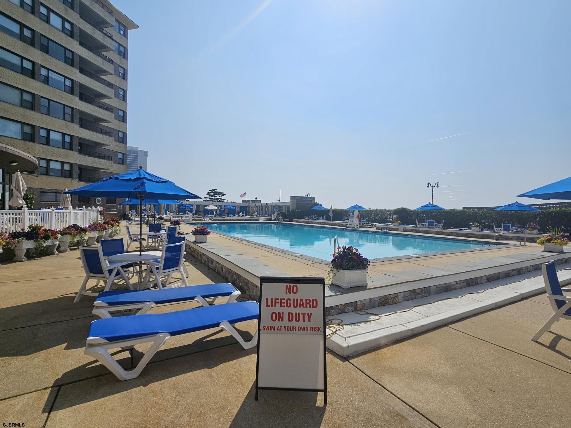 101 South Raleigh Avenue, Unit 734 Atlantic City, NJ 08401 - Photo 20 of 32 a view of a swimming pool with sitting area