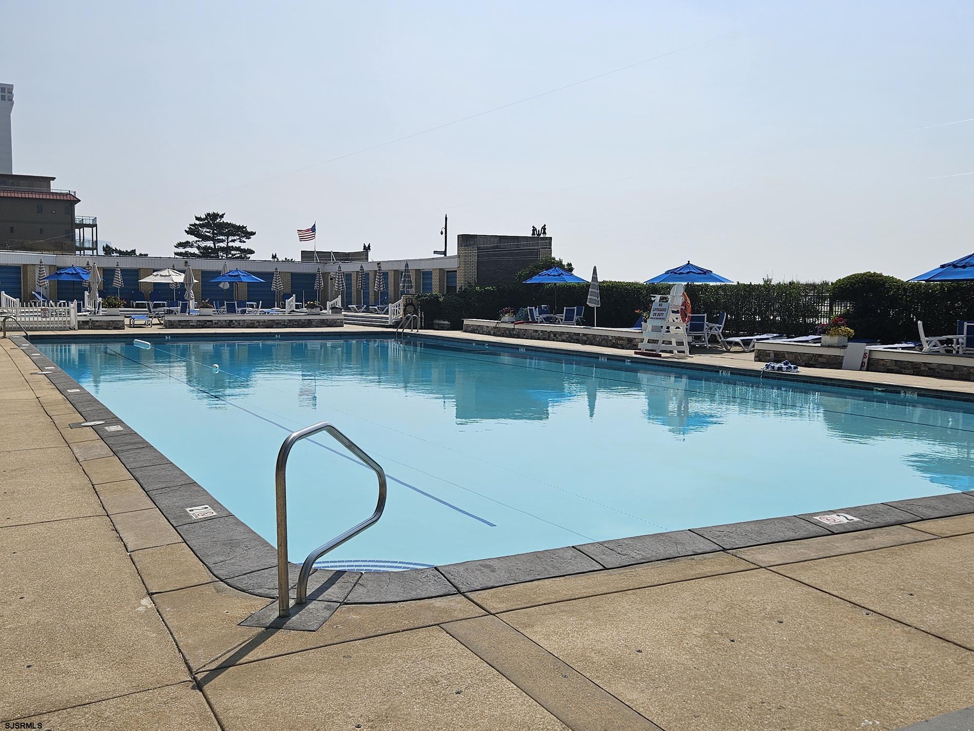 101 South Raleigh Avenue, Unit 734 Atlantic City, NJ 08401 - Photo 24 of 32 a view of a lake with boats and trees in the background