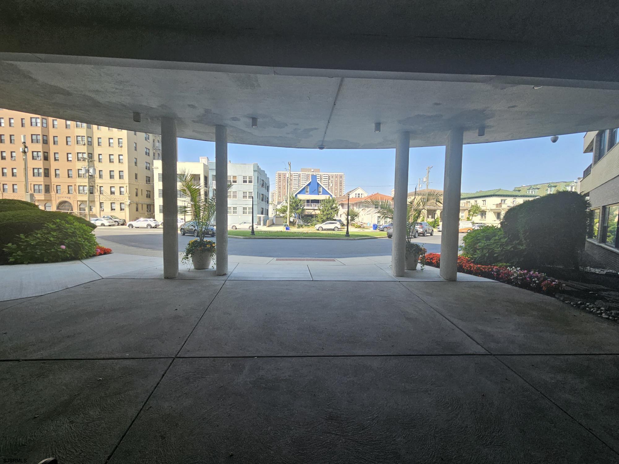101 South Raleigh Avenue, Unit 734 Atlantic City, NJ 08401 - Photo 25 of 32 a view of an empty room with a sliding door and a window