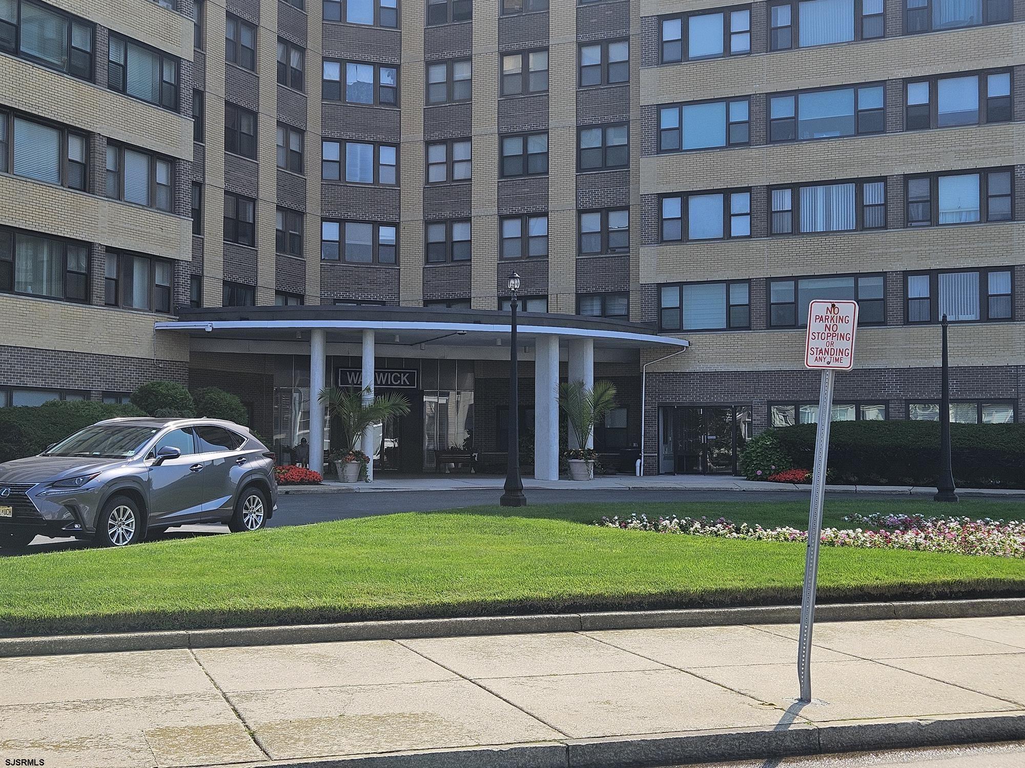 101 South Raleigh Avenue, Unit 734 Atlantic City, NJ 08401 - Photo 27 of 32 a front view of a building with a garden and plants