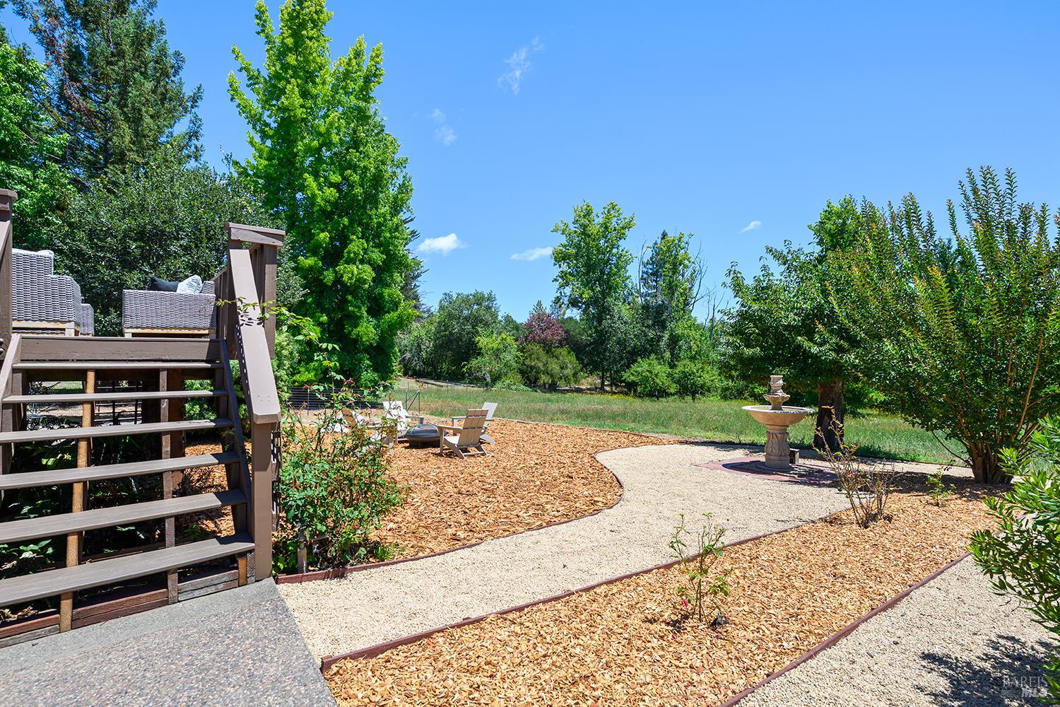 7595 Giusti Road Forestville, CA 95436 - Photo 37 of 41 a view of a backyard with sitting area