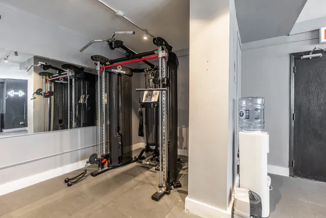 a view of a room with gym equipment