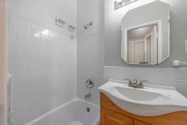 a bathroom with a sink and a bathtub