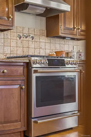 a view of entryway with wooden floor and stairs
