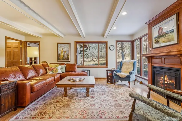 a view of a dining room with furniture and window