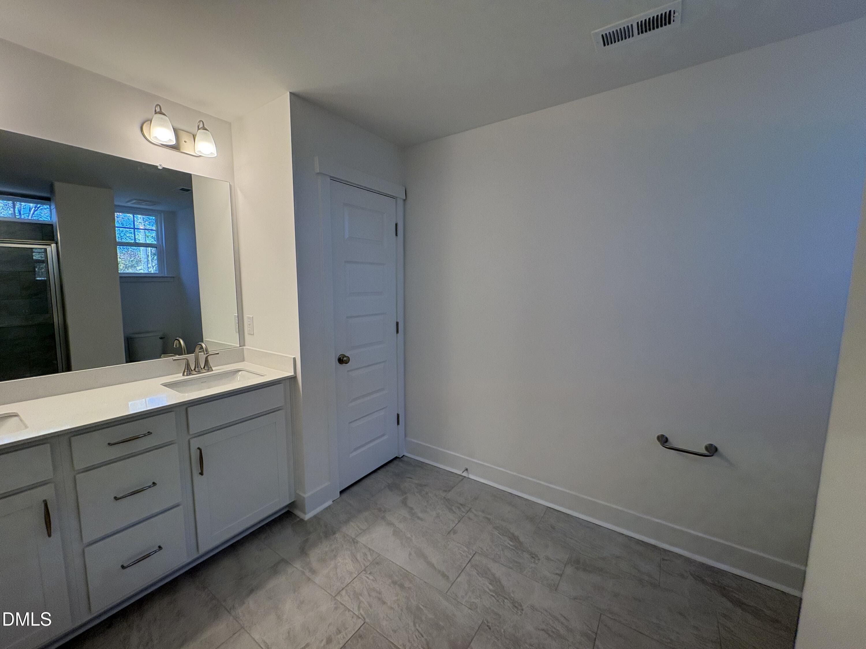 6044 Dunzo Drive Raleigh, NC 27617 - Photo 17 of 48 Primary Bath