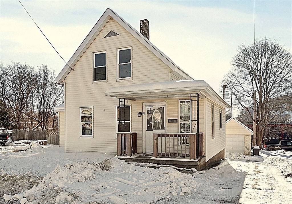 a view of a small white house