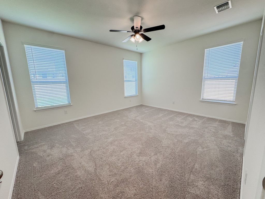 4024 Pinto Lane Round Rock, TX 78665 - Photo 15 of 31 a view of an empty room with a window