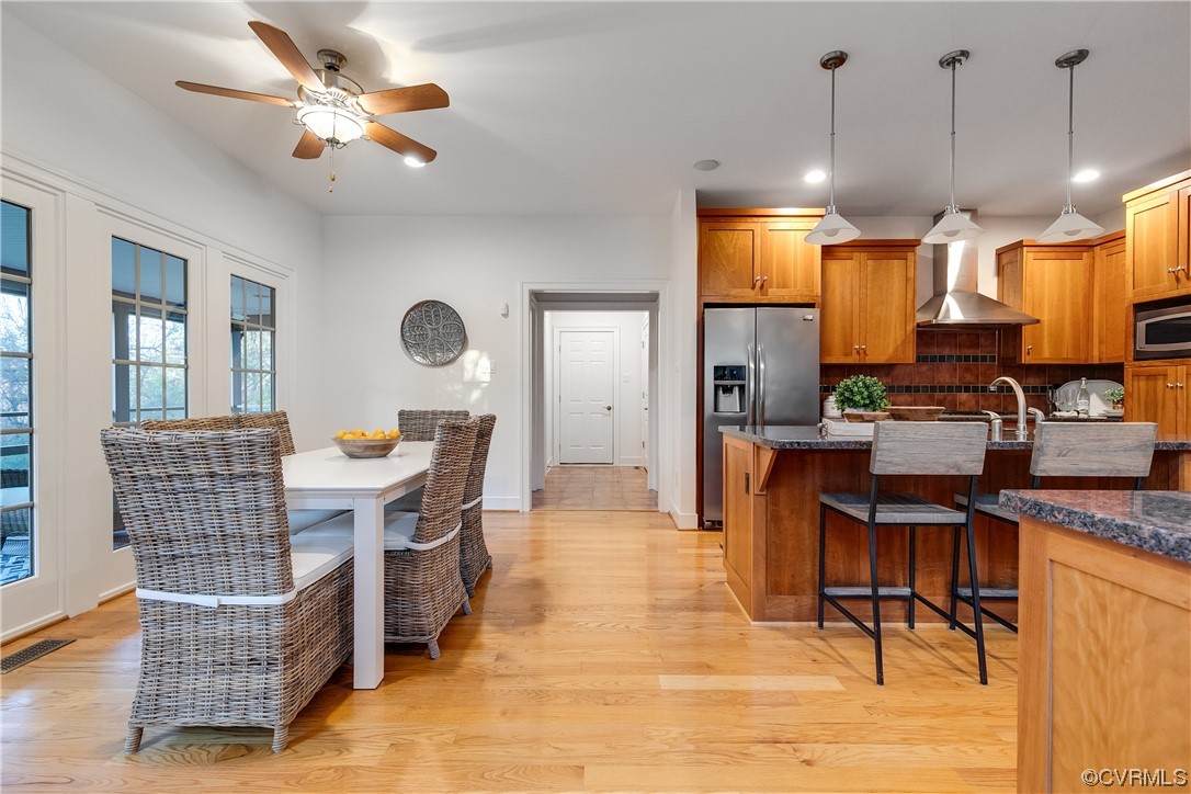 12110 Iron Forge Drive Midlothian, VA 23113 - Photo 17 of 50 a view of kitchen with dining room and wooden floor
