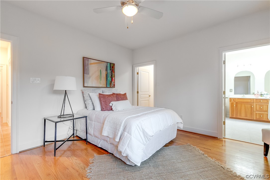 12110 Iron Forge Drive Midlothian, VA 23113 - Photo 21 of 50 a bedroom with a bed and a chandelier
