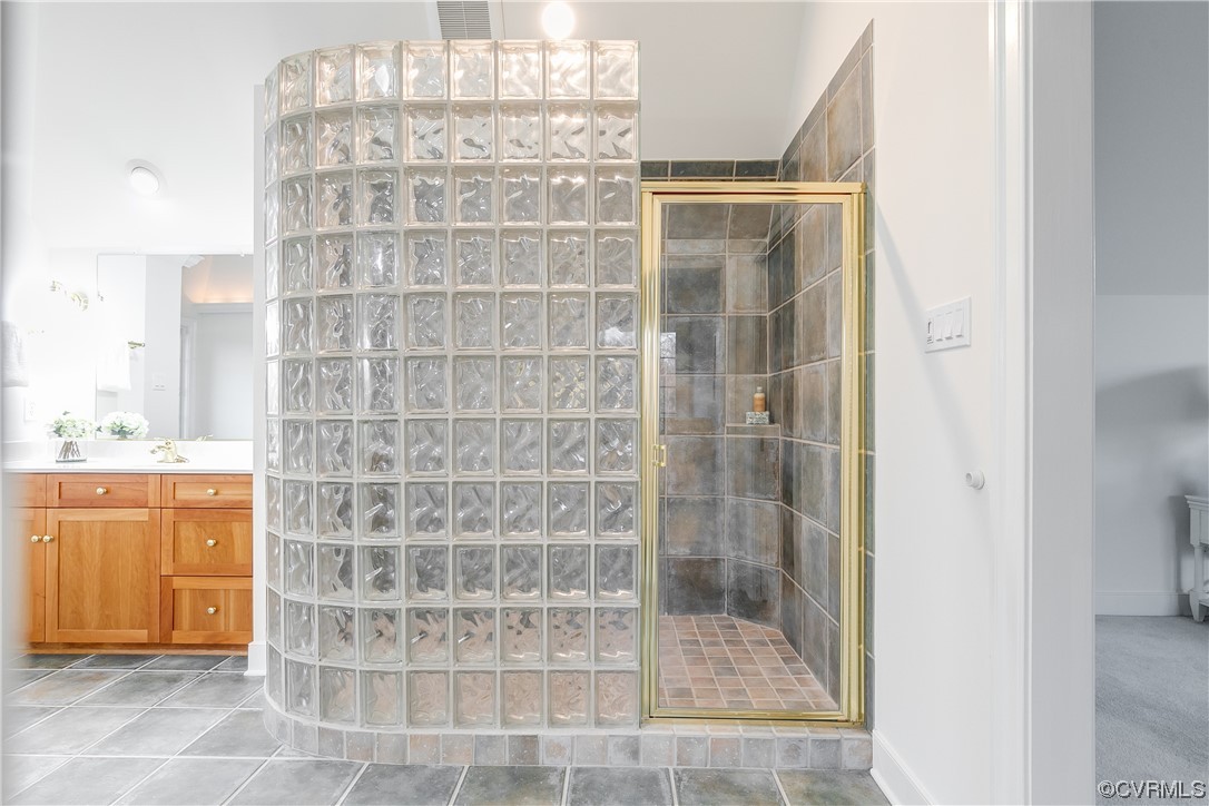 12110 Iron Forge Drive Midlothian, VA 23113 - Photo 29 of 50 a bathroom with a shower and a sink