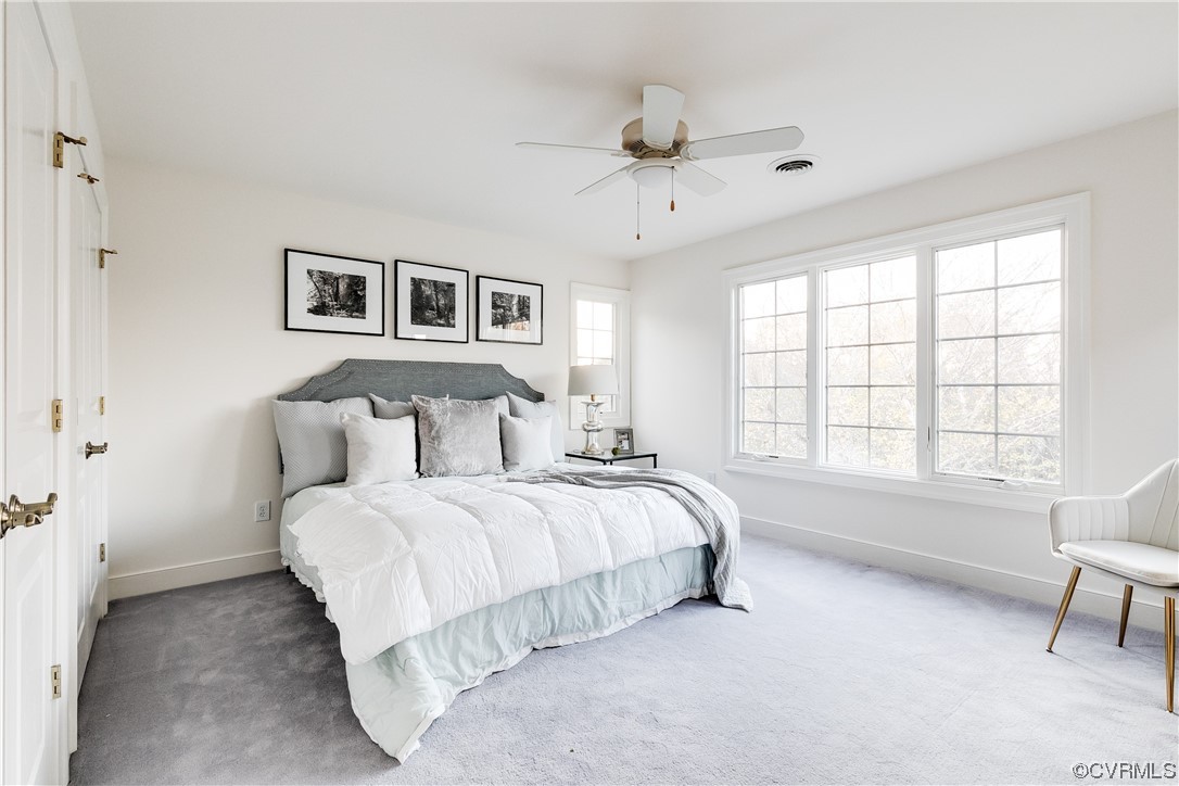 12110 Iron Forge Drive Midlothian, VA 23113 - Photo 31 of 50 a spacious bedroom with a bed and a window