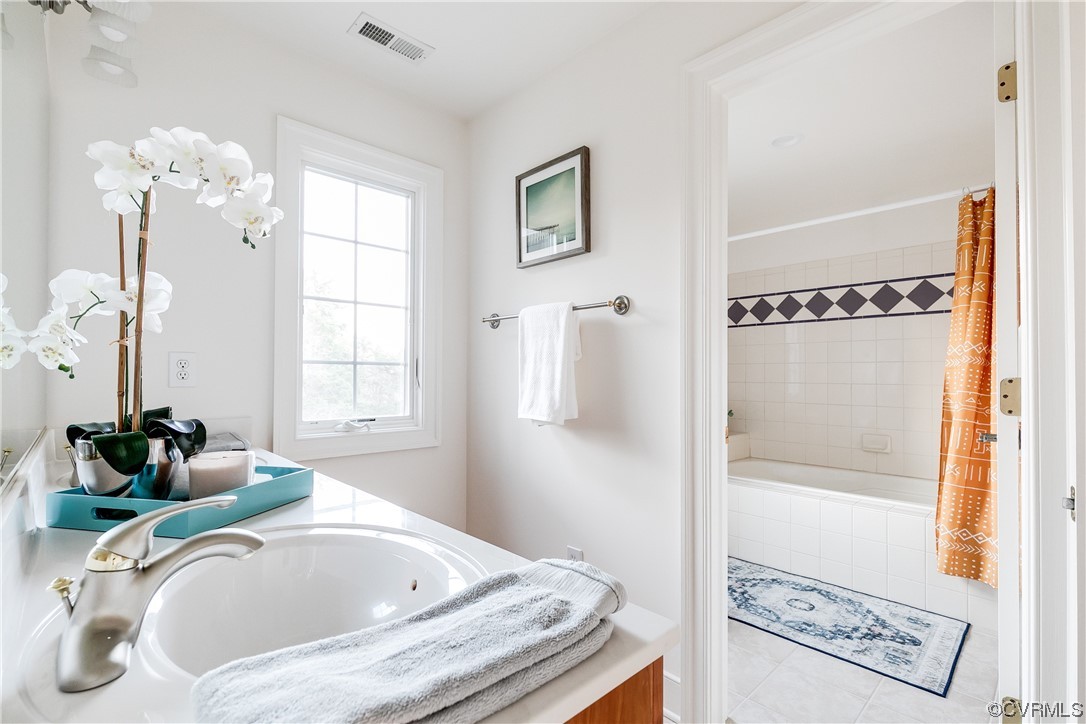 12110 Iron Forge Drive Midlothian, VA 23113 - Photo 32 of 50 a bathroom with a tub sink and shower
