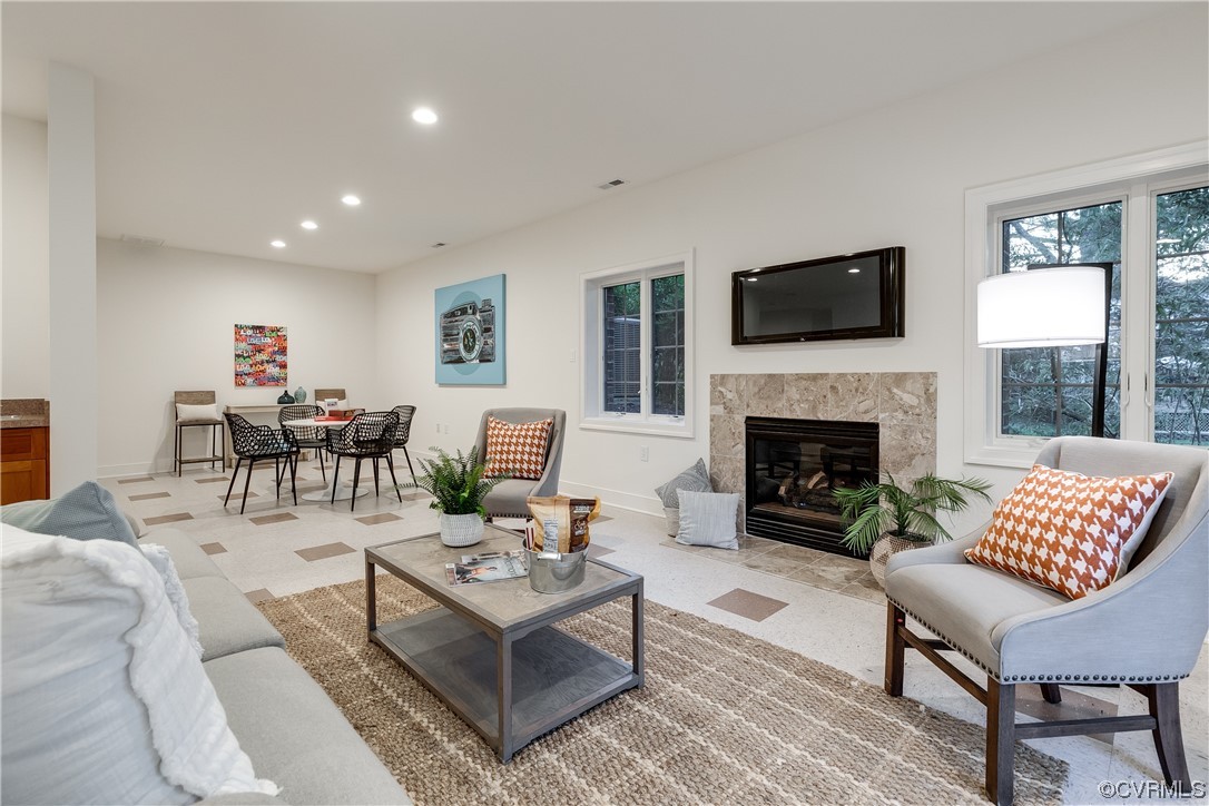 12110 Iron Forge Drive Midlothian, VA 23113 - Photo 37 of 50 a living room with furniture fireplace and window