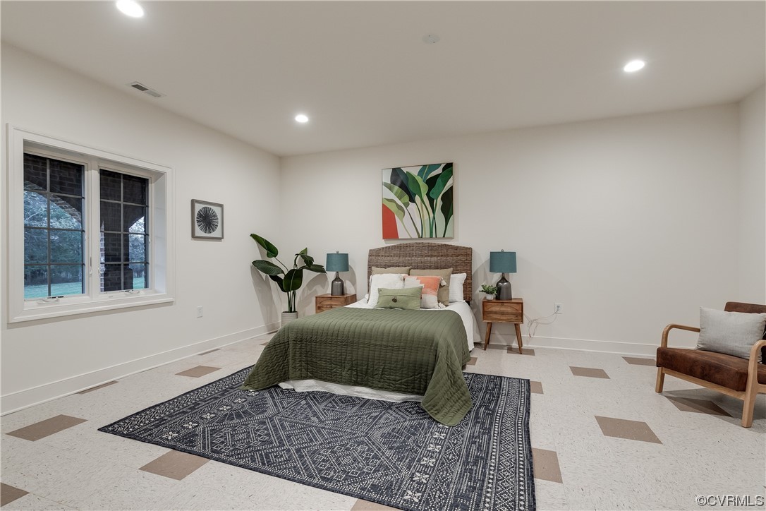 12110 Iron Forge Drive Midlothian, VA 23113 - Photo 42 of 50 a bedroom with a bed and a couch