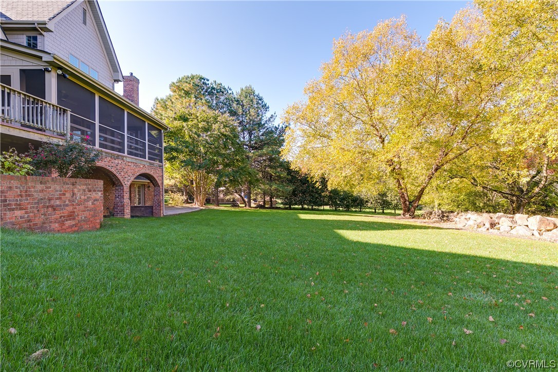 12110 Iron Forge Drive Midlothian, VA 23113 - Photo 48 of 50 a view of yard with swimming pool and green space