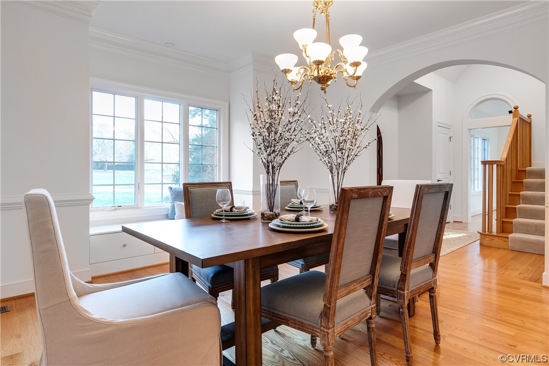 12110 Iron Forge Drive Midlothian, VA 23113 - Photo 6 of 50 a view of a dining room with furniture window and wooden floor