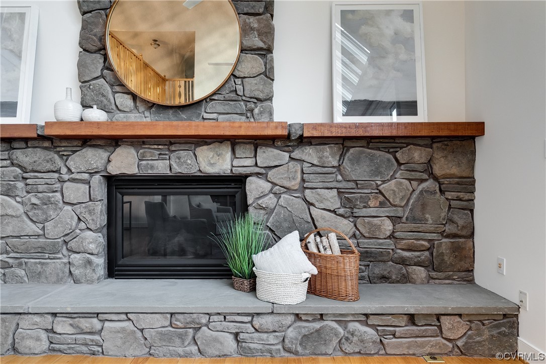 12110 Iron Forge Drive Midlothian, VA 23113 - Photo 10 of 50 a kitchen with a stove and a wooden floor
