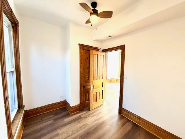 a view of entryway with wooden floor