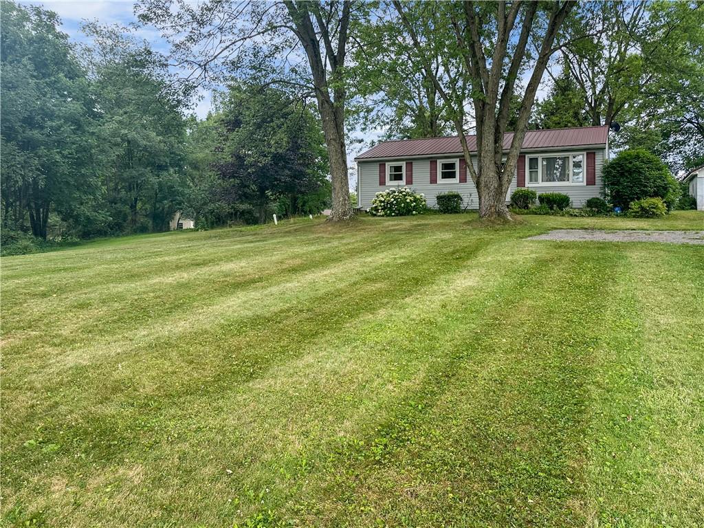 726 West Liberty Road Slippery Rock, PA 16057 - Photo 2 of 23 a front view of a house with a yard