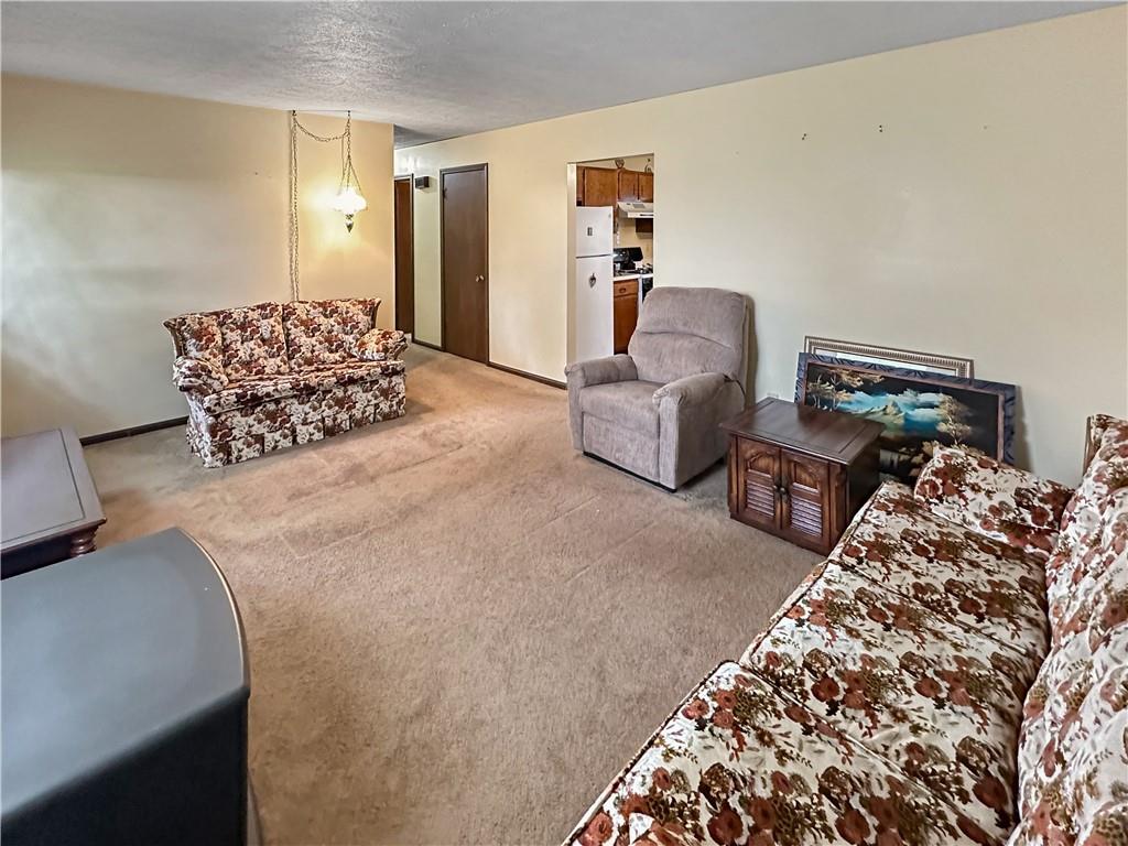 726 West Liberty Road Slippery Rock, PA 16057 - Photo 9 of 23 a bedroom with bed and a couch
