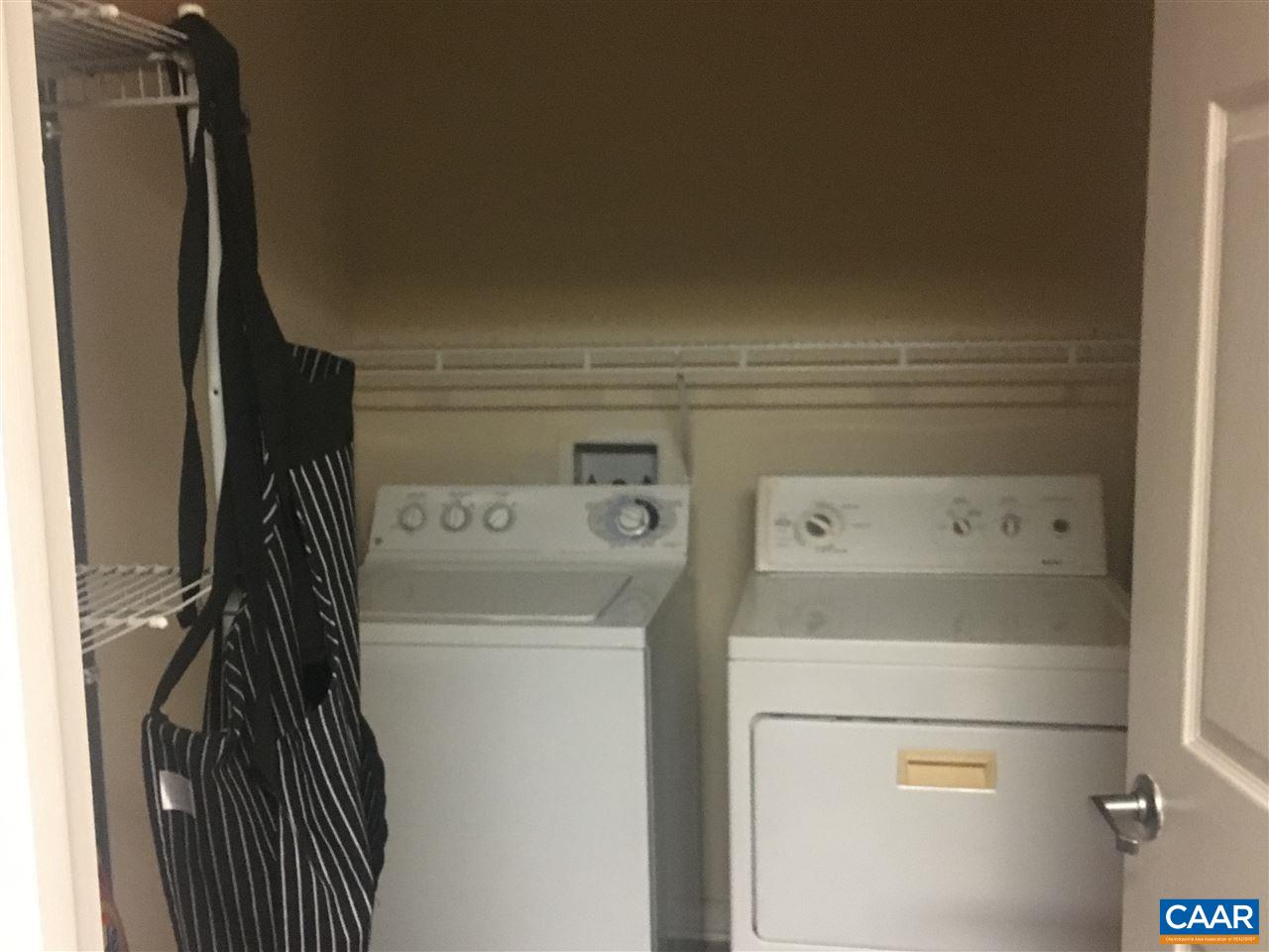 175 Yellowstone Drive, Unit 102 Charlottesville, VA 22903 - Photo 3 of 5 a close up of a washer and dryer