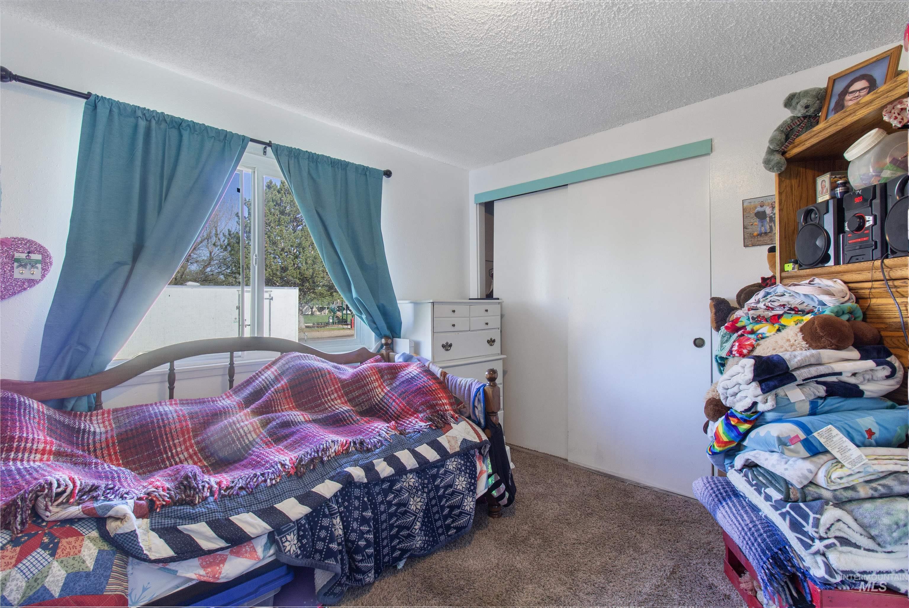 636 Main Street Hansen, ID 83334 - Photo 22 of 37 Sliding closet doors provide access to storage