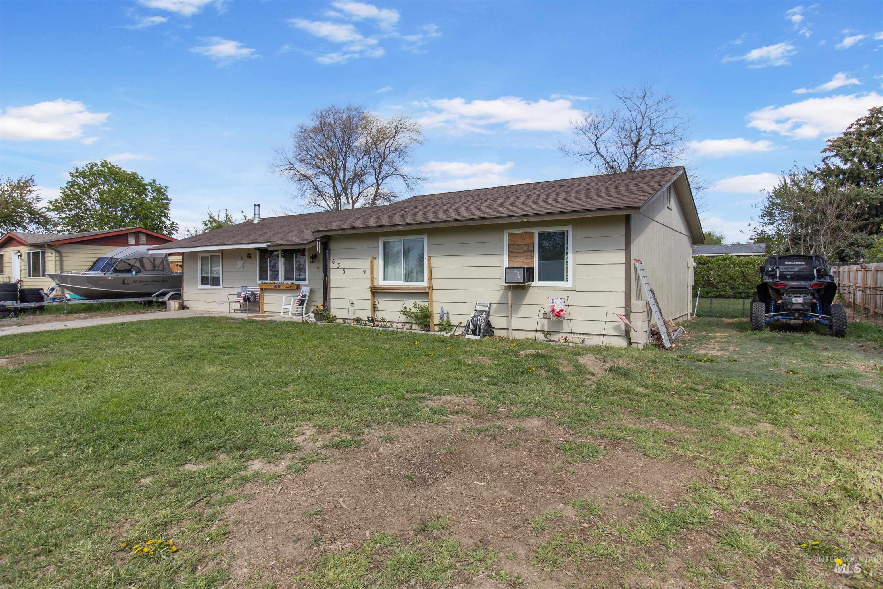636 Main Street Hansen, ID 83334 - Photo 28 of 37 Ranch-style residence featuring light-toned siding and a brown shingle roof